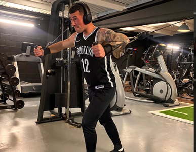 Steven training on a cable machine in the gym