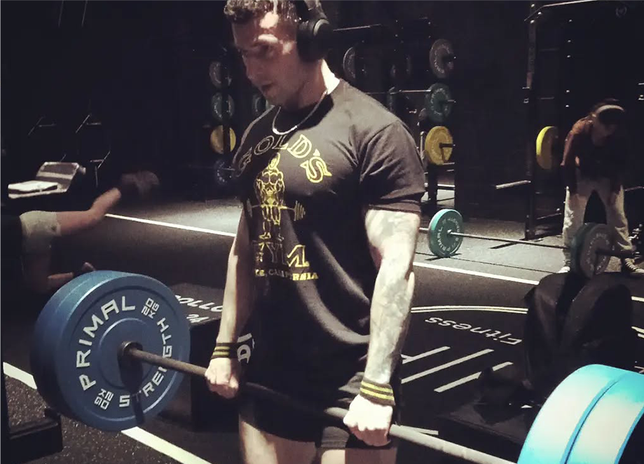 Steven training with a heavy barbell in the gym